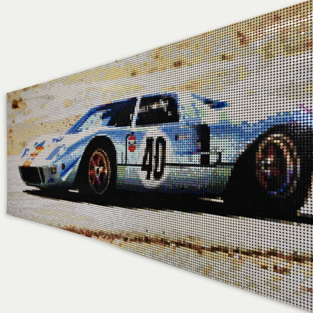 A racing car made of round tiles, seen at an angle