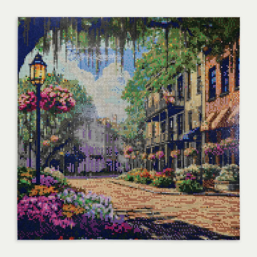 A street with flowers and lanterns made of round tiles